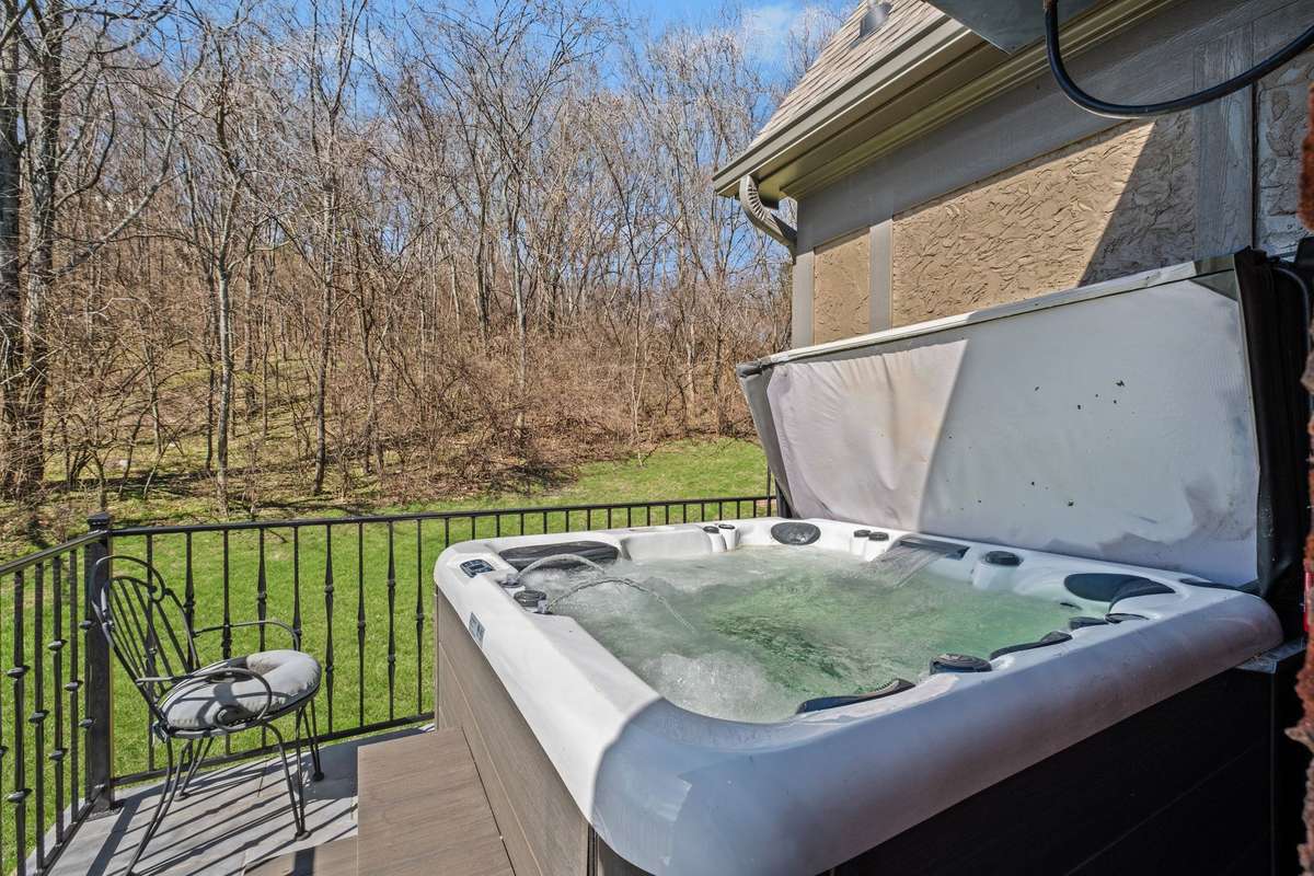 Private deck with hot tub.