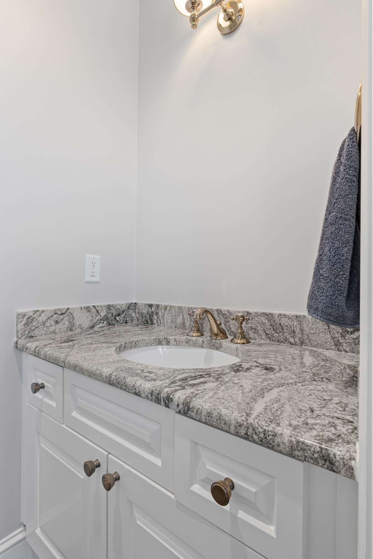 Conveniently location half bath.
