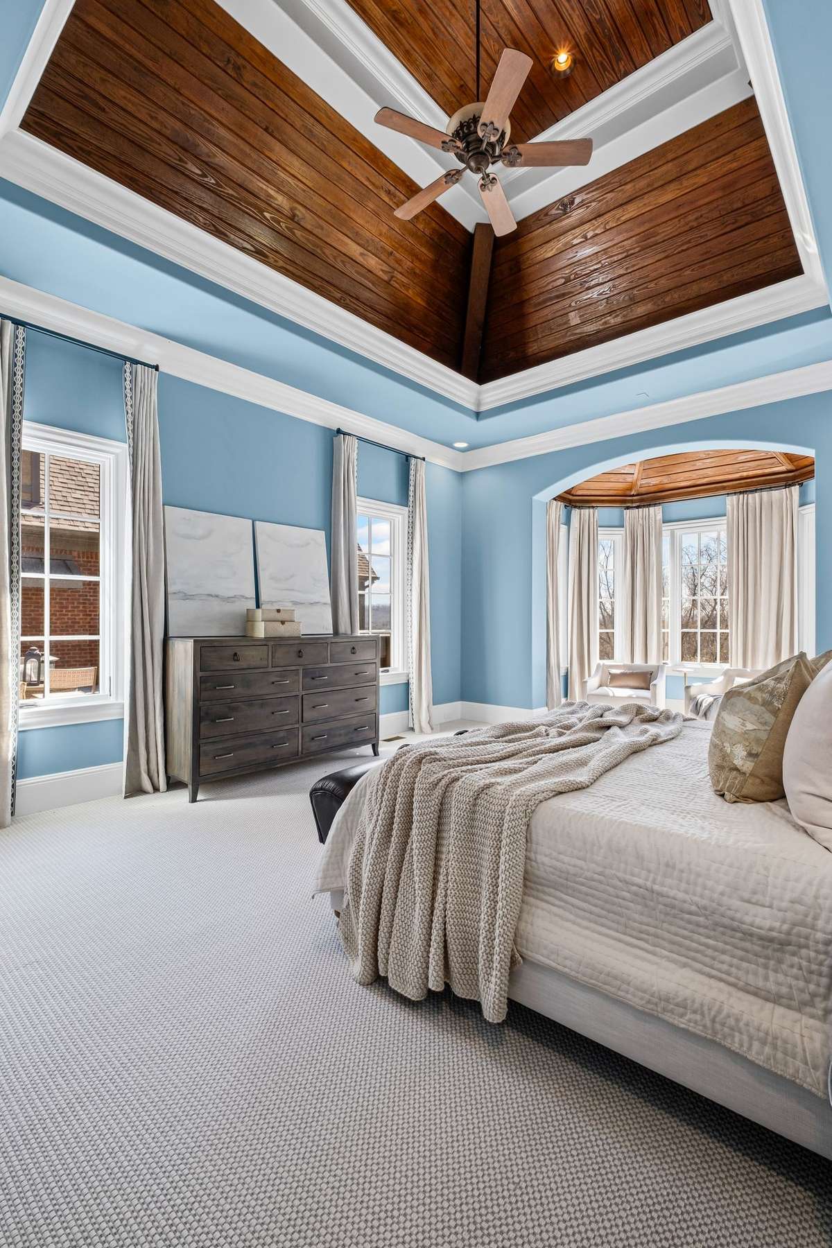 Sky-high ceilings, stunning views, and direct access to its own walk-out deck- complete with hot tub.