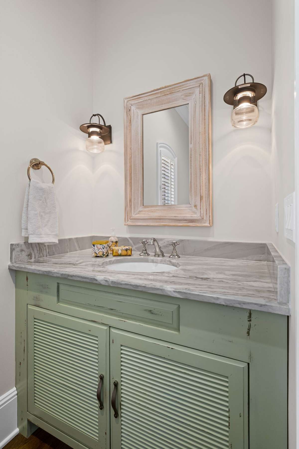 Spacious, bright, and beautifully designed half bath.