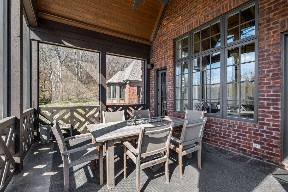 The perfect blend of indoor comfort and outdoor beauty- this serene space offers breathtaking views and a relaxing spot to unwind year-round.