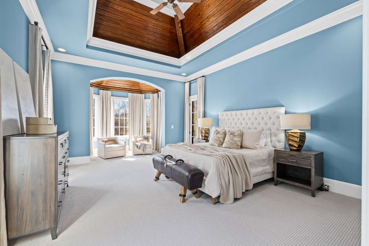 Sky-high ceilings, stunning views, and direct access to its own walk-out deck- complete with hot tub.