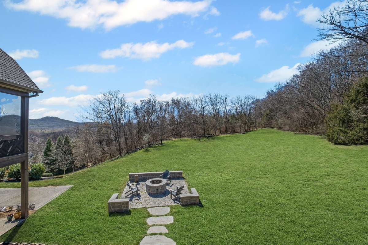 Fire pit with flat back yard boasts countless possibilities.