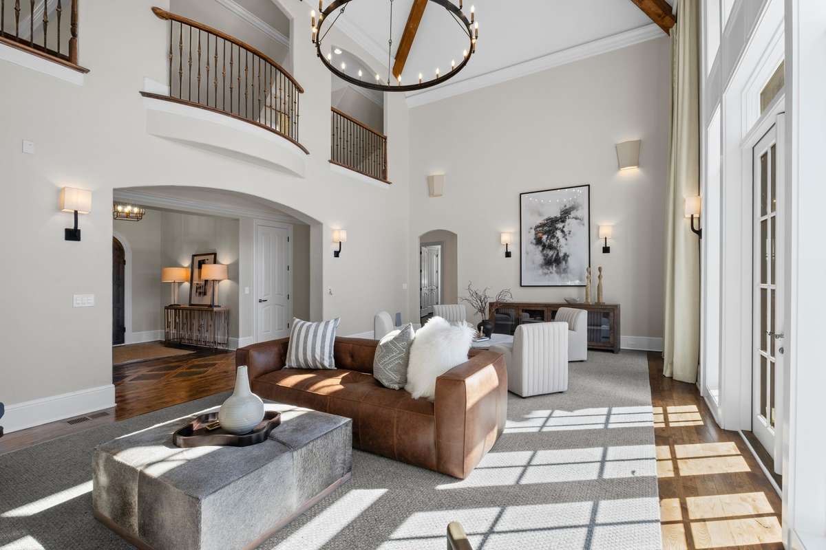 Flooded with natural light, this stunning space showcases floor-to-ceiling windows that frame breathtaking Williamson County views.