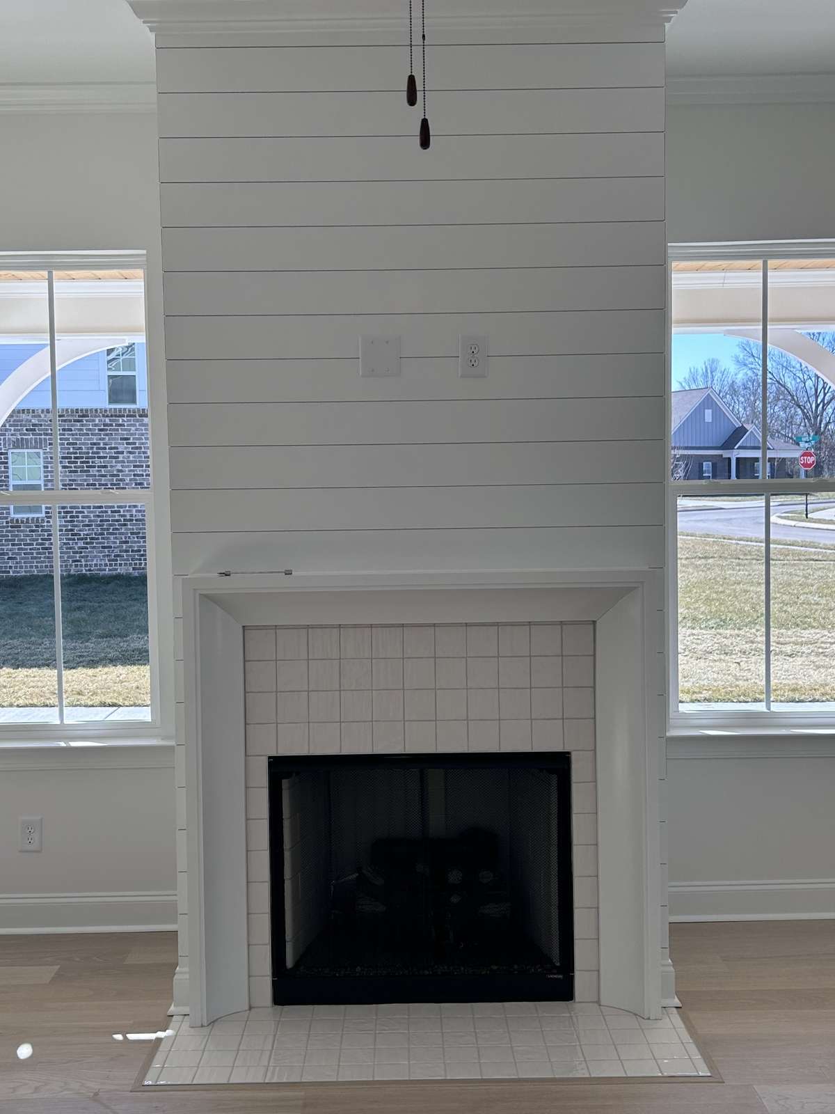 The gas fireplace with windows on both sides is stunning