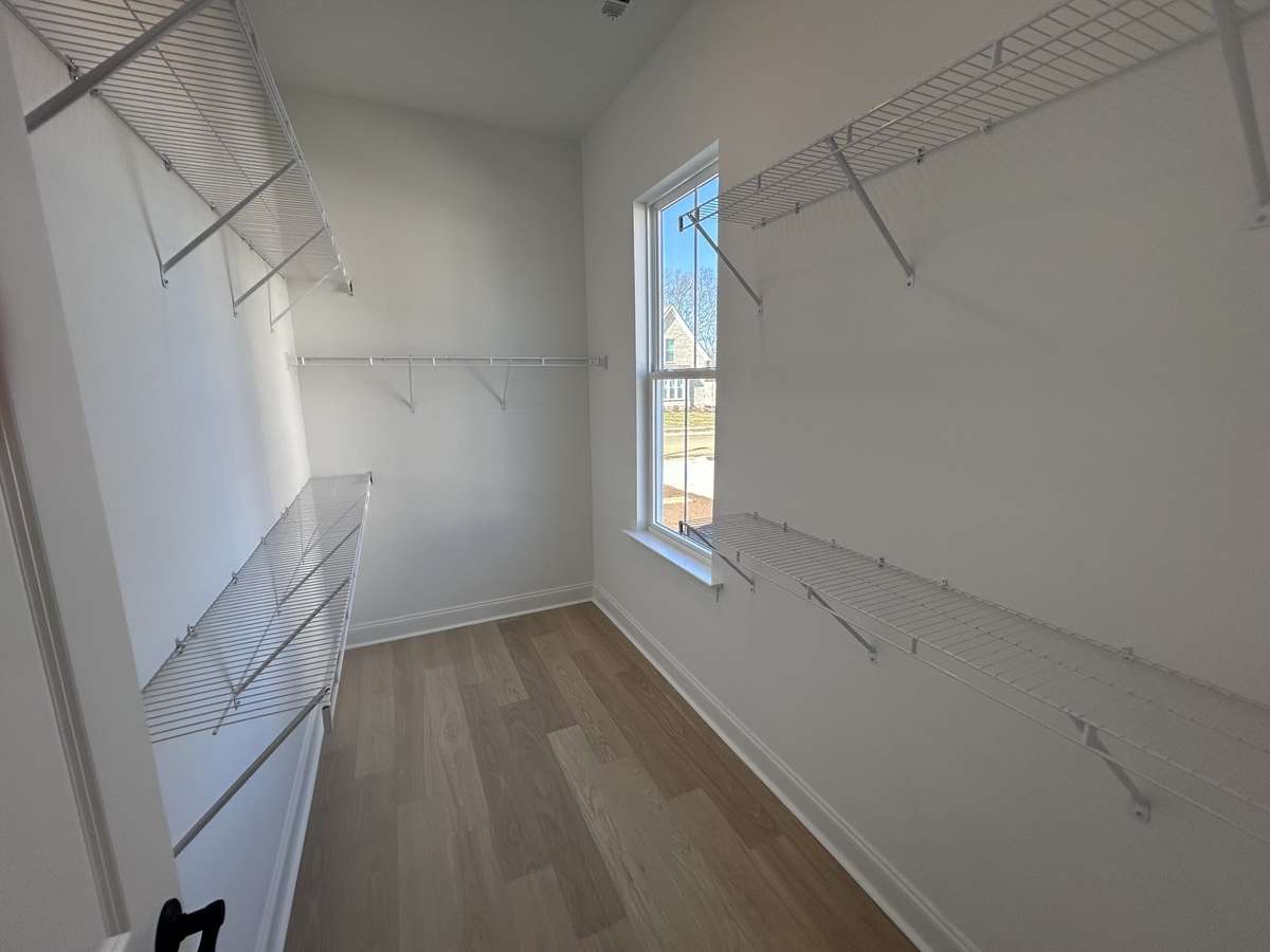 Large walkin closet in the primary suite.