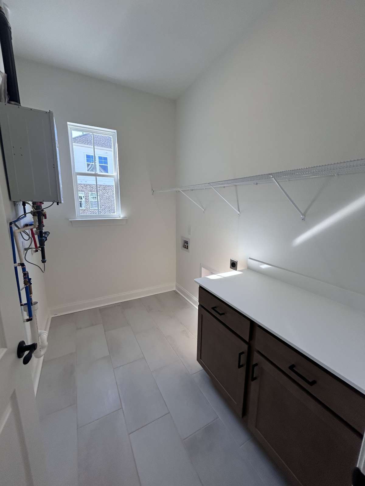 laundry room located in the back of the house