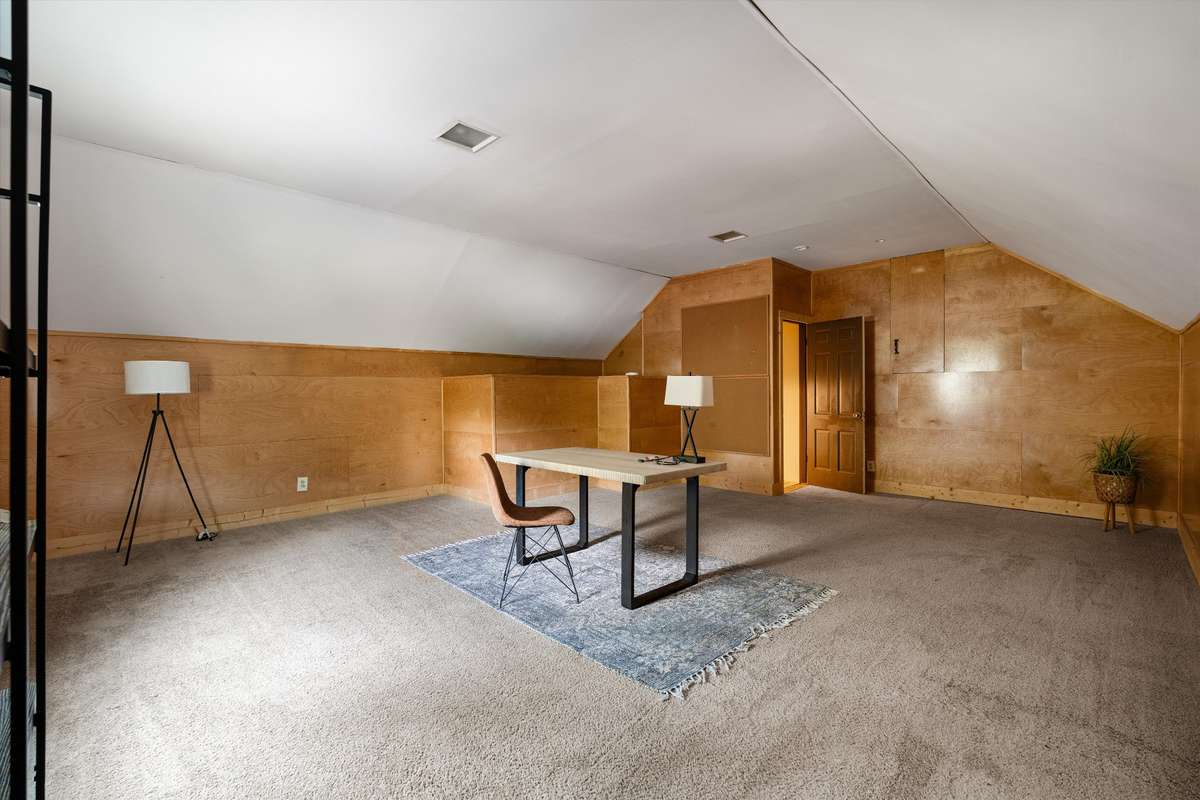 Enjoy the flexibility of this oversized room over the garage, offering a quiet, separate space for work or play.