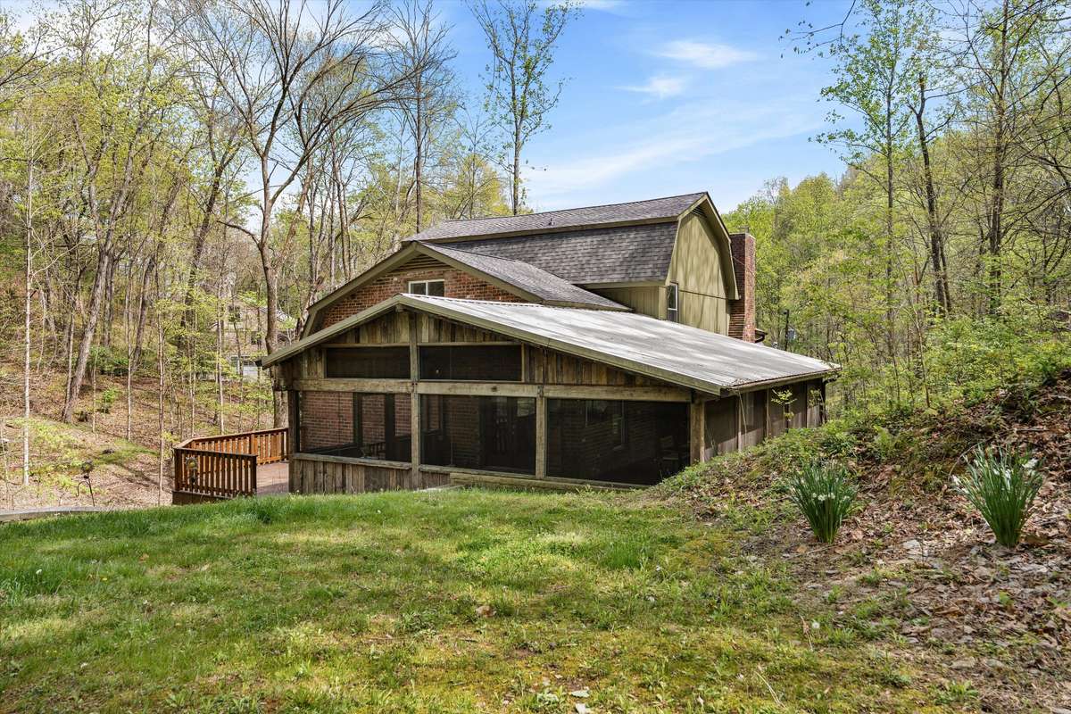 Enjoy the best of both worlds with a flat yard for everyday living and rolling, wooded hills that create a stunning natural backdrop.