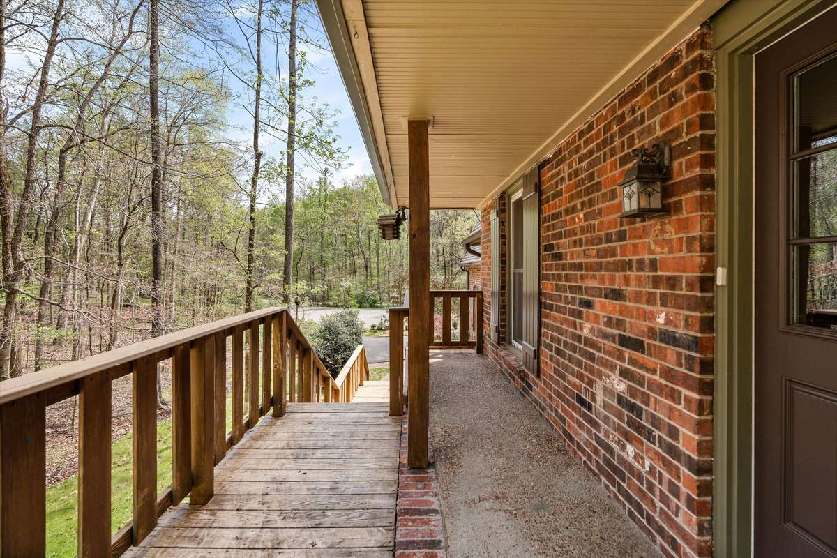 Walking up these wood deck steps feels like arriving at your own Tennessee mountain getaway.