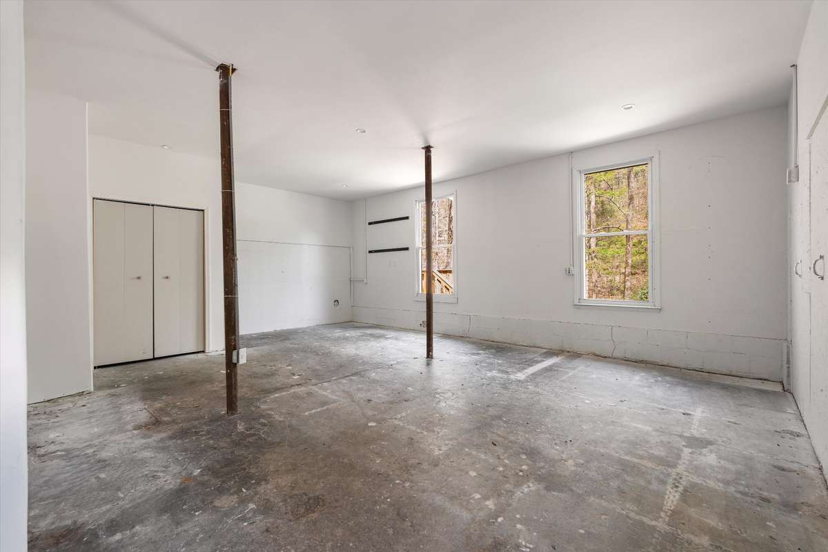Partially finished basement area that has endless possibilities.