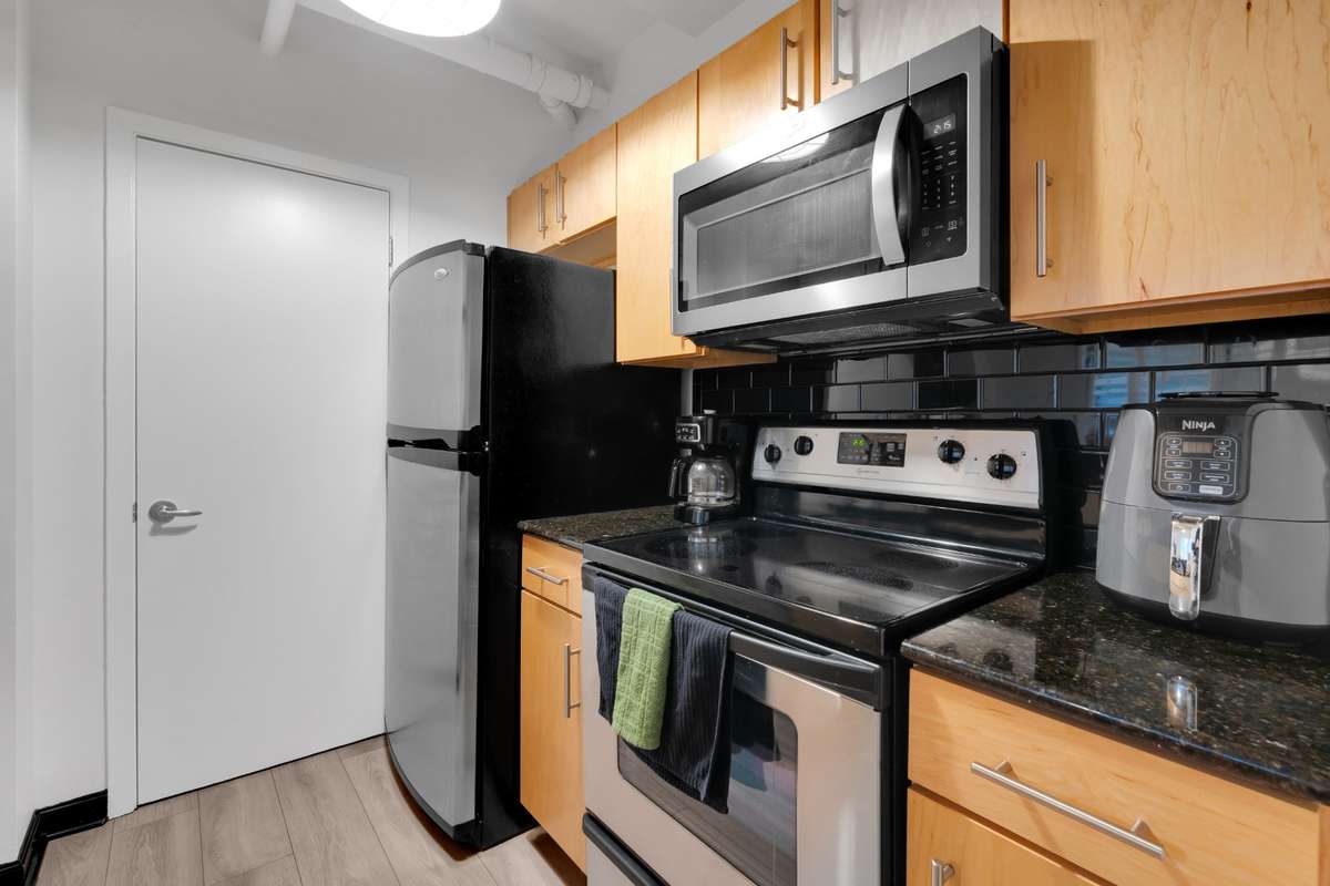 Granite countertops - all appliances remain including the washer and dryer