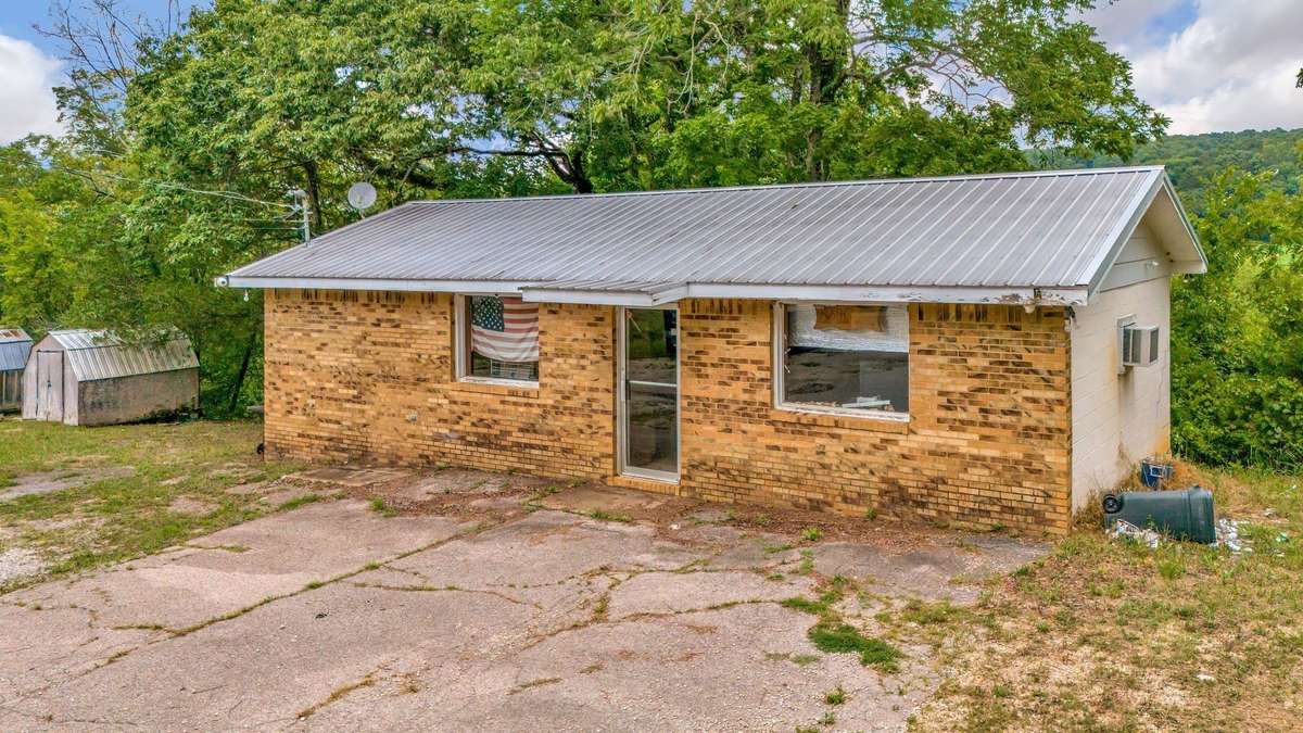 AERIAL Drone View
RIVERFRONT PROPERTY!!!
6.95 Acres+/- and Building that was Storefront for Heath's Canoe Rentals for 39 Years