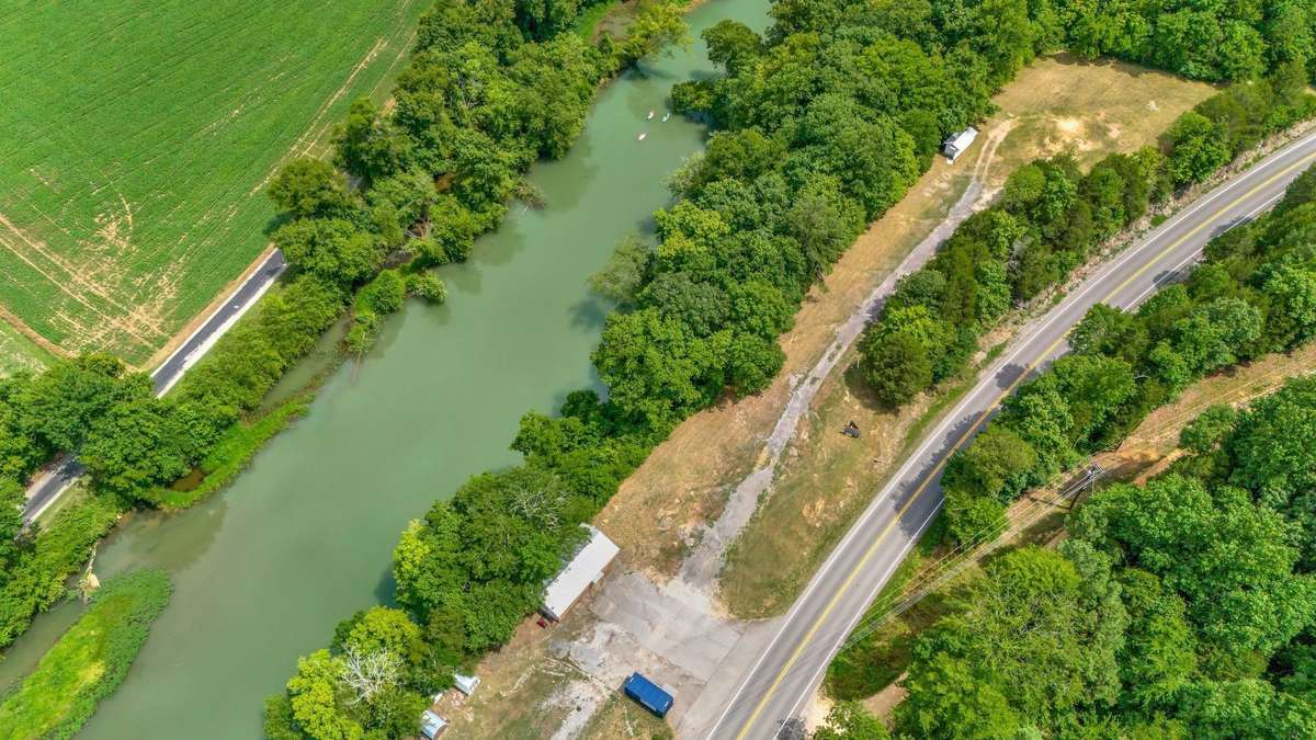AERIAL Drone View
6.95 Acres+/- and Building that was Storefront for Heath's Canoe Rentals