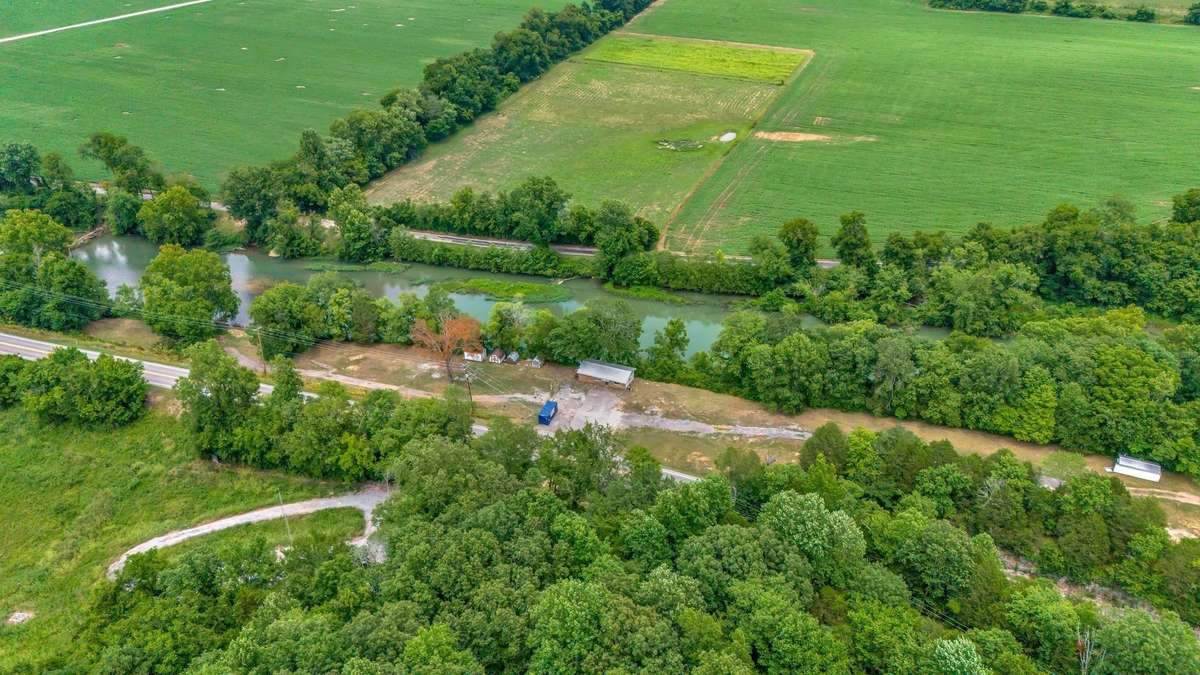 Seller believes land could possibly be divided into 6-7 Lots and for Riverfront Cabins
HOWEVER-Seller just wants to sell AS-IS.