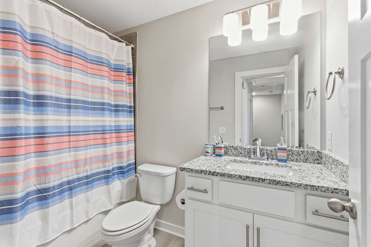 Upstairs guest bathroom with a clean, modern design.