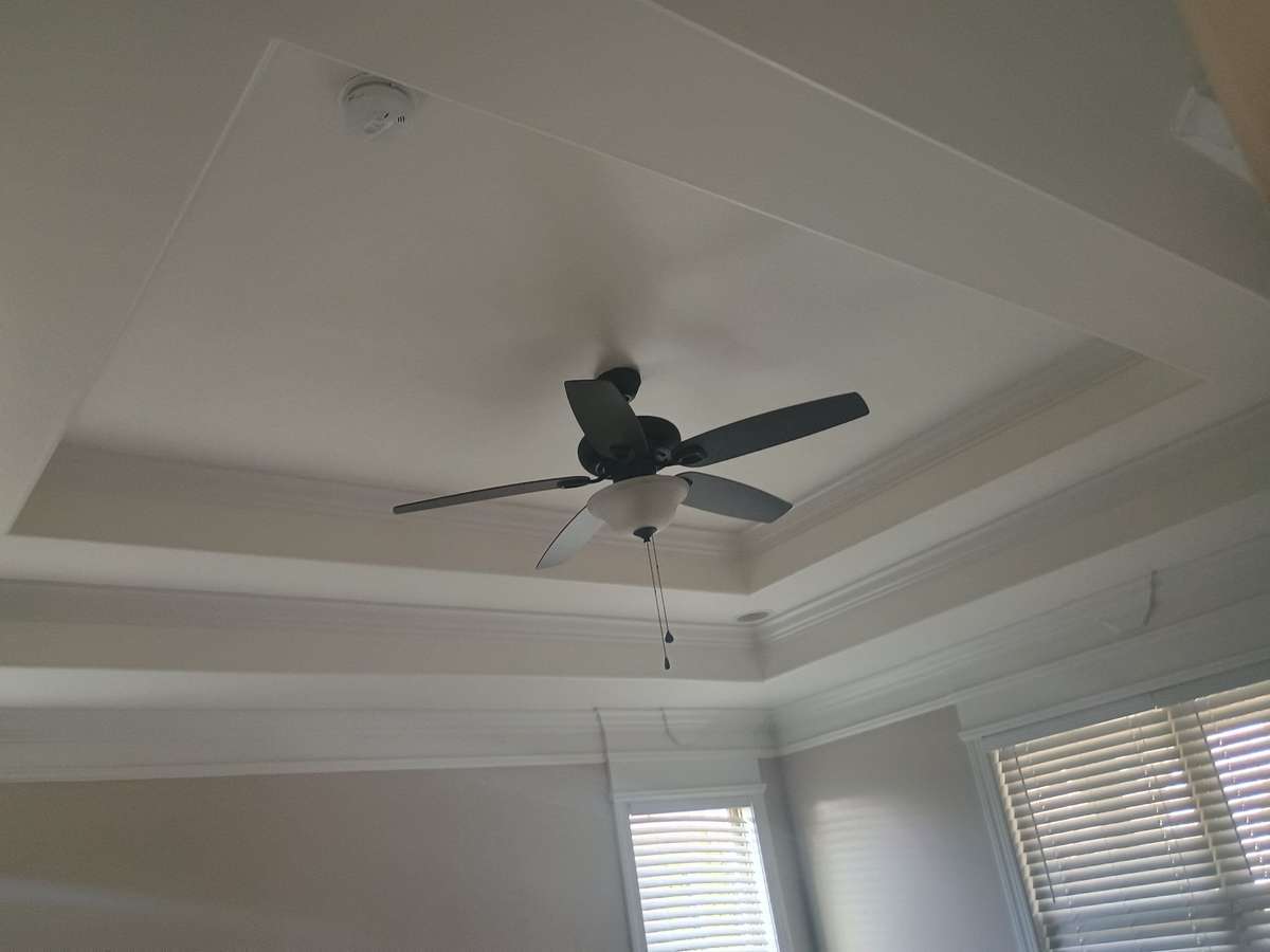 Coffered ceiling in primary bedroom