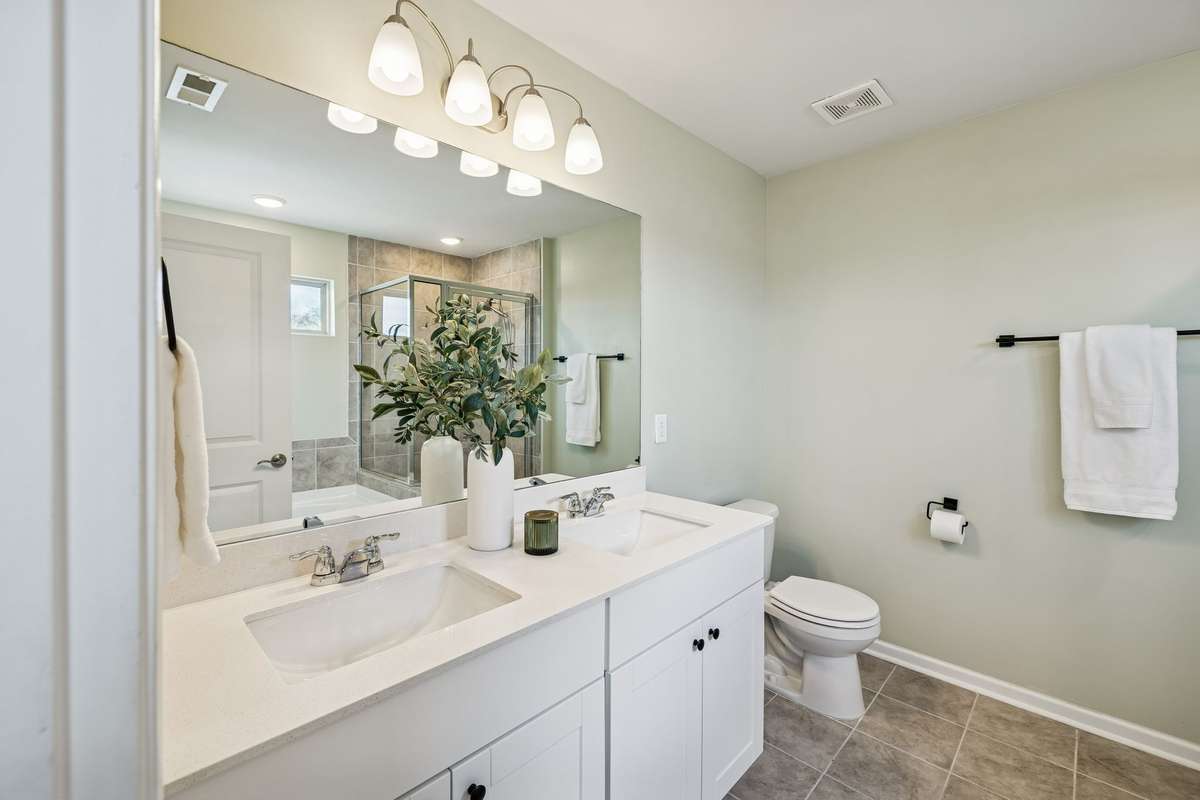 Primary Bathroom with Double Vanities