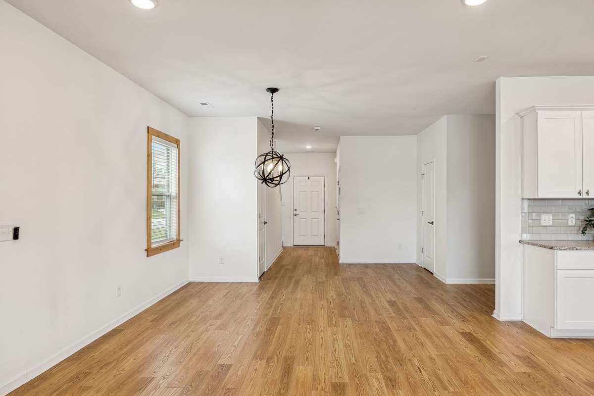 Dining Area with upgraded light fixture.