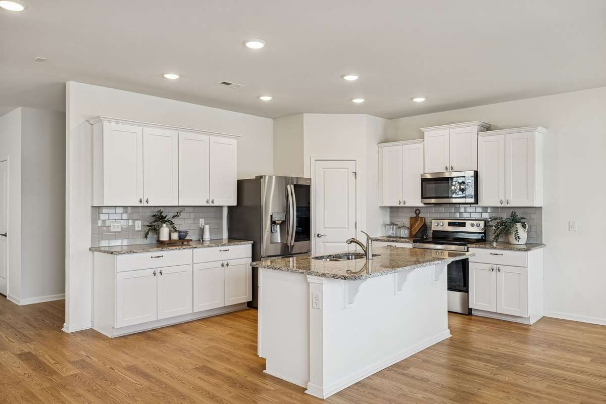 Spacious kitchen with large pantry.