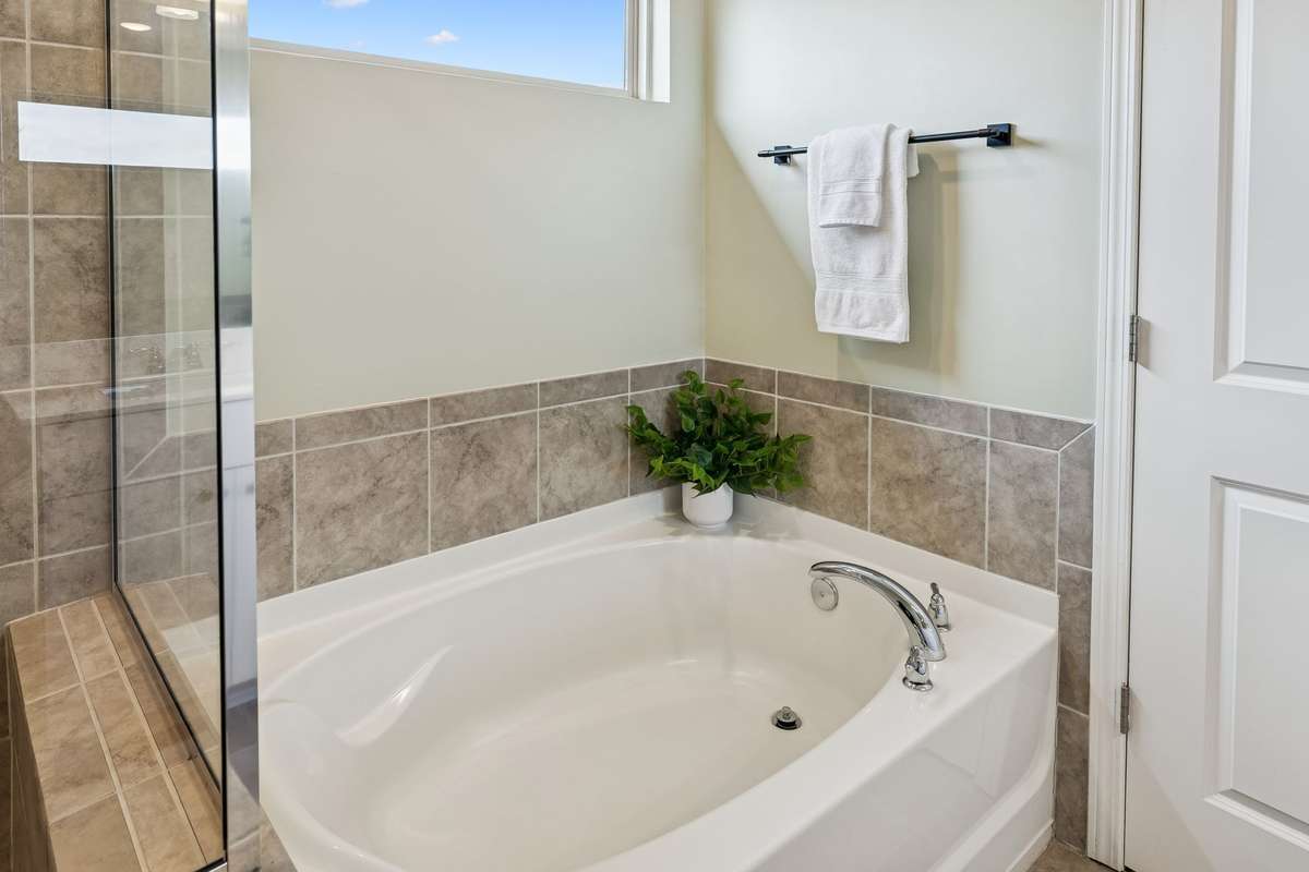 Relax in your beautiful garden tub!