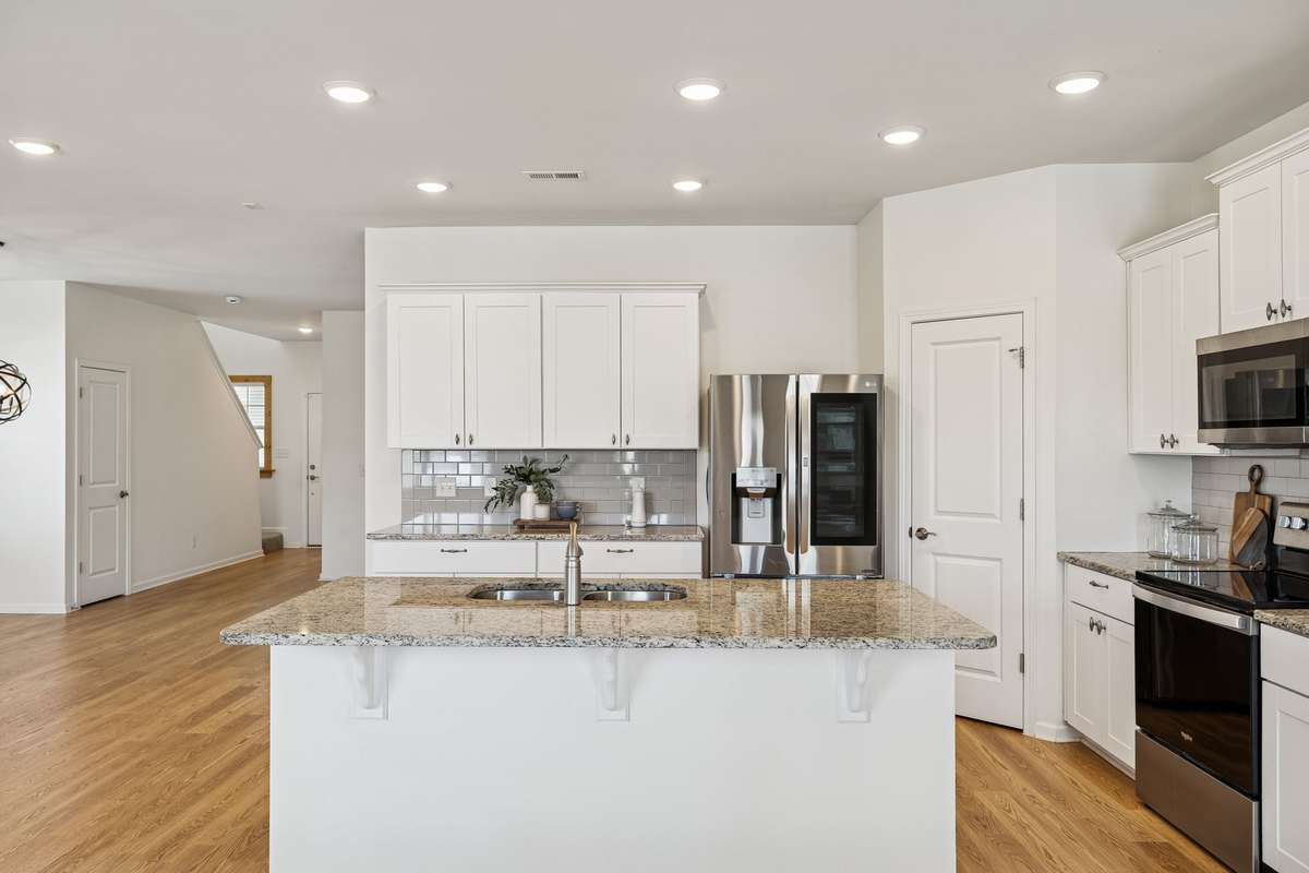 Stainless steel appliances - including refrigerator and upgraded LG dishwasher.