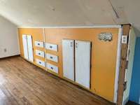 Upstairs expansion space with built-ins