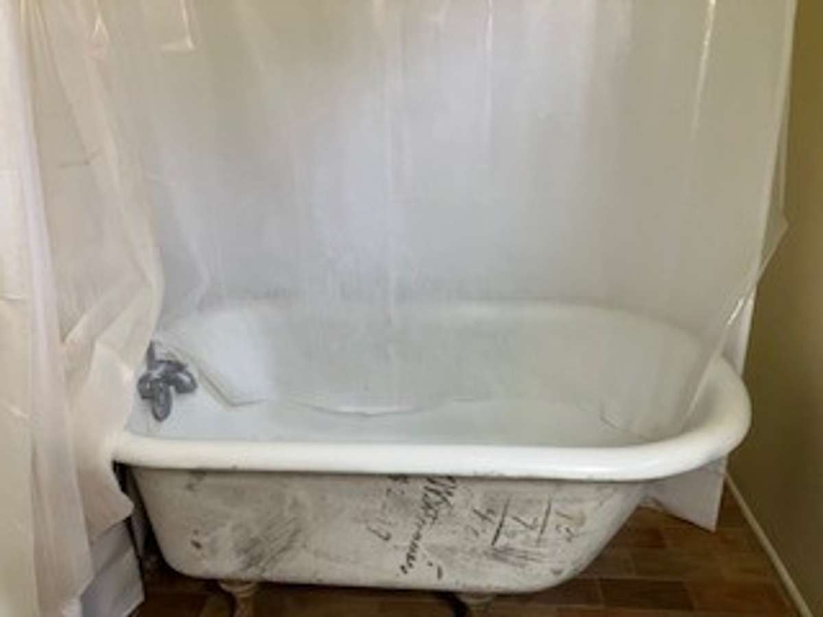 Antique tub with shower