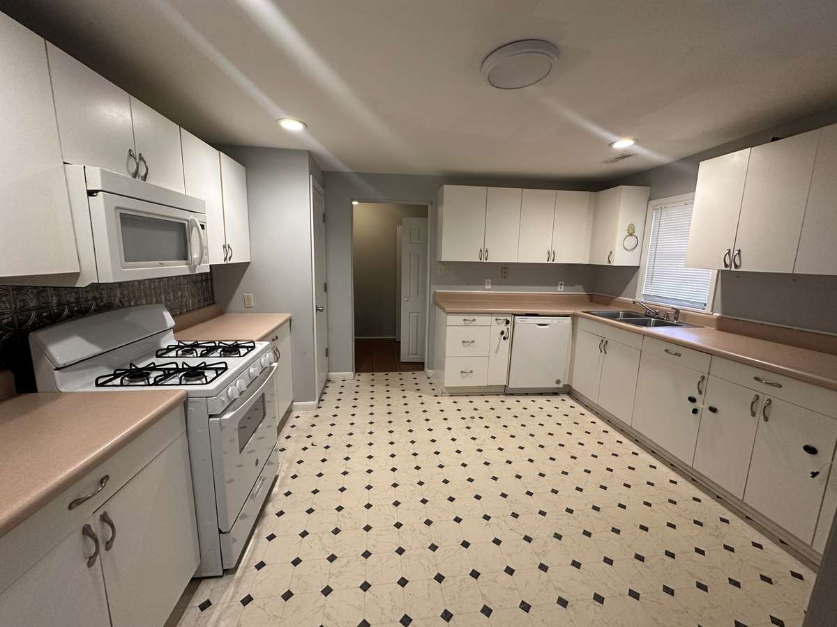 Large kitchen with some new appliances
