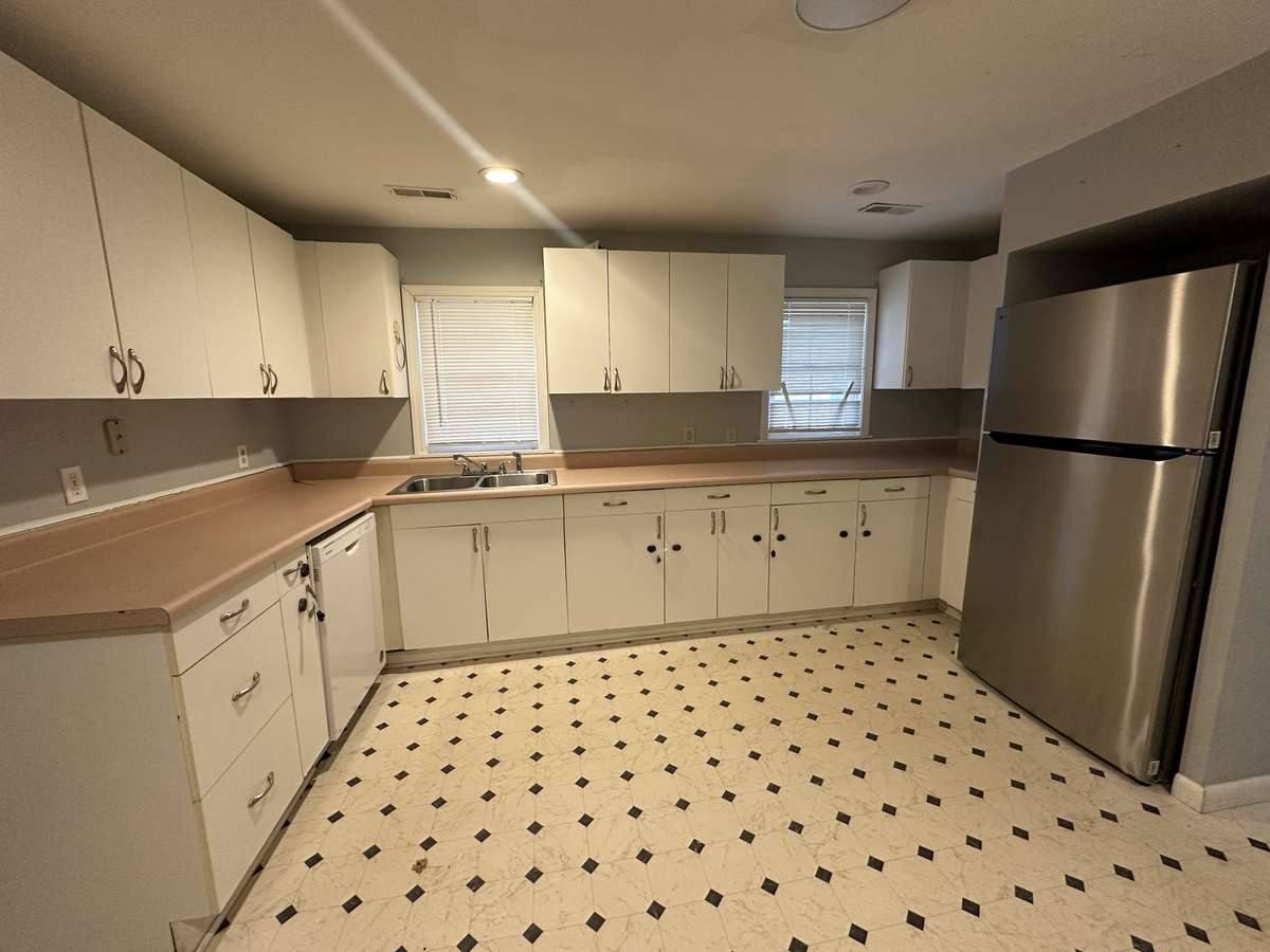 Kitchen overlooks back yard