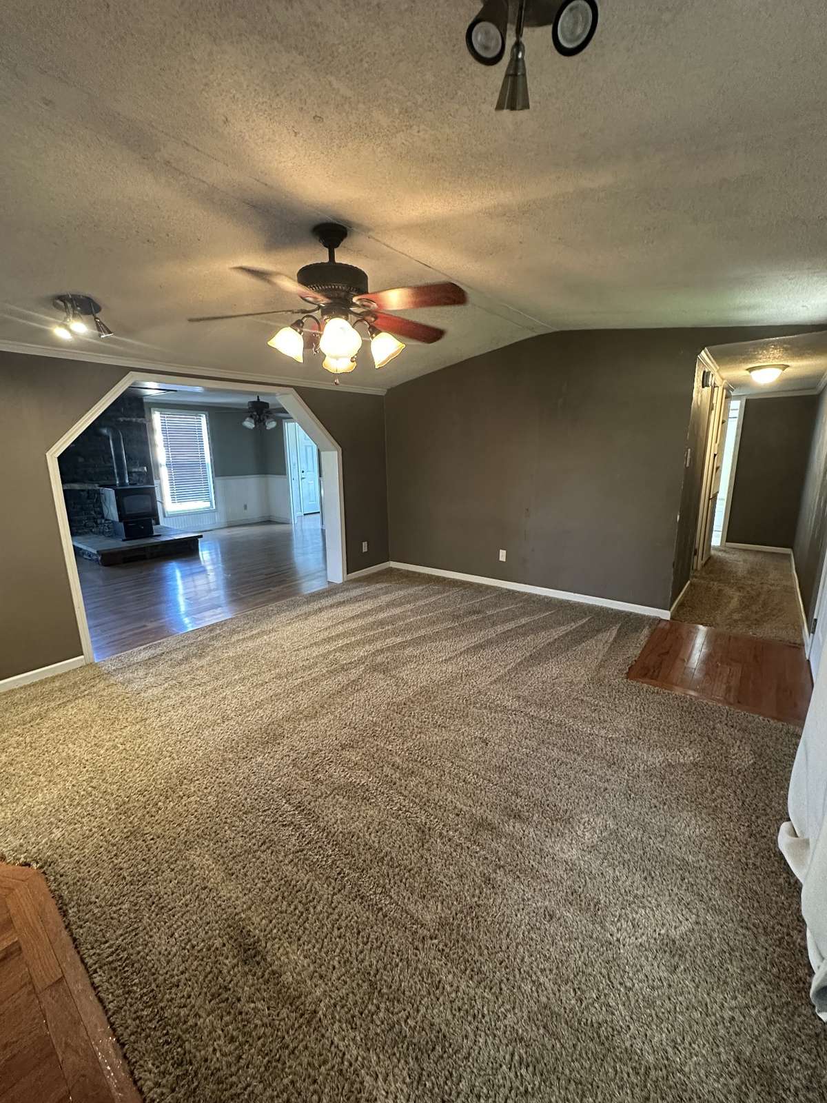 Foyer with access to kitchen, living room and bedrooms