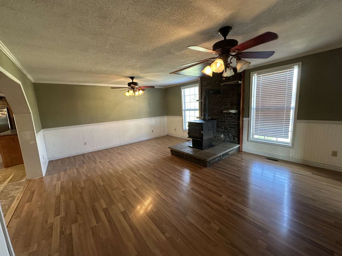 Wood burning fireplace in living room