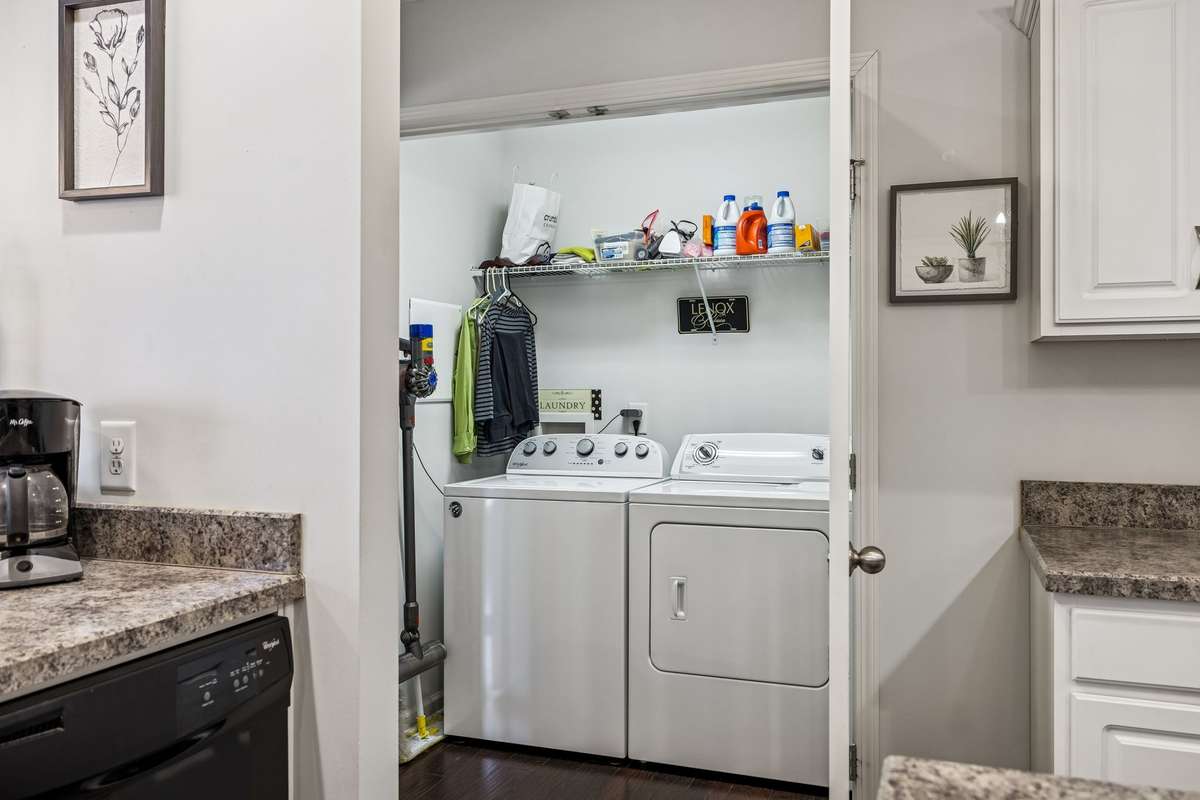 Laundry room off the kitchen- Washer & Dryer remain! The Dyson Vacuum is negotiable