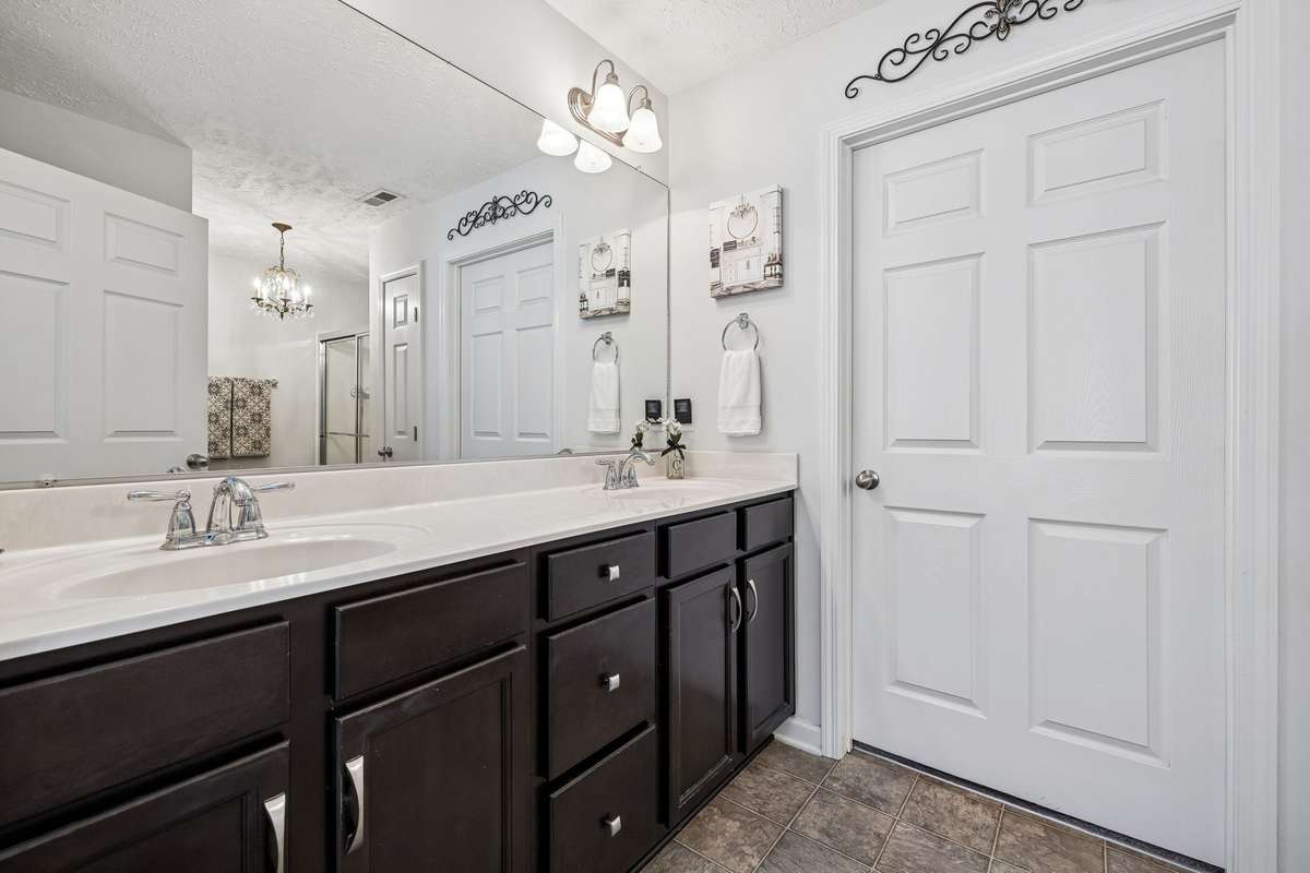 Raised double vanity in the Primary ensuite bath