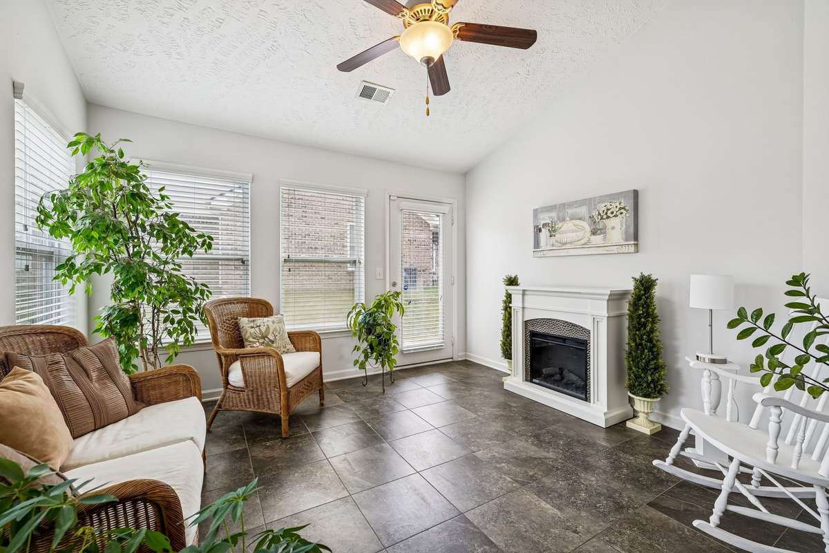 Ideal for study, exercise, craft or even 3rd bedroom option! French door to back small concrete patio area