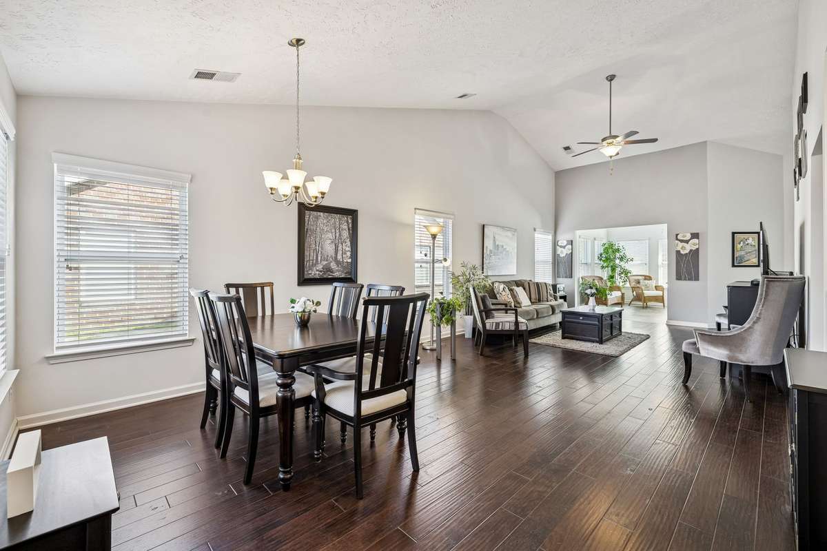 Beautiful wide plank hand scraped hardwoods throughout the main living areas
