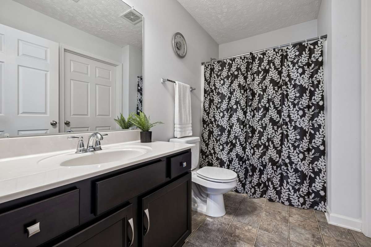 Second full bath with private door into second bedroom for additional privacy