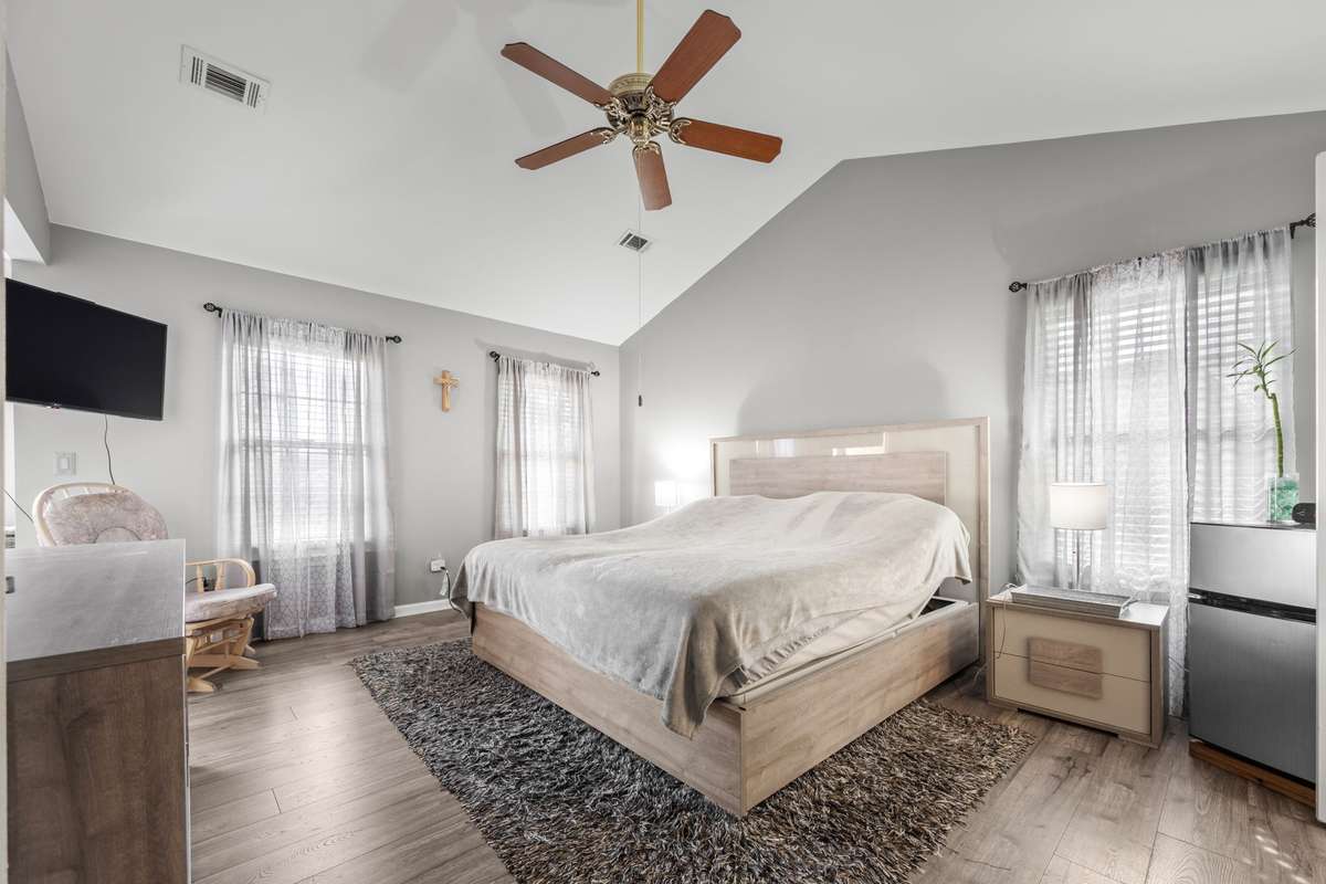 Large primary bedroom which also has a generous size sitting room perfect for a nursery or use to relax to watch your favorite movie!