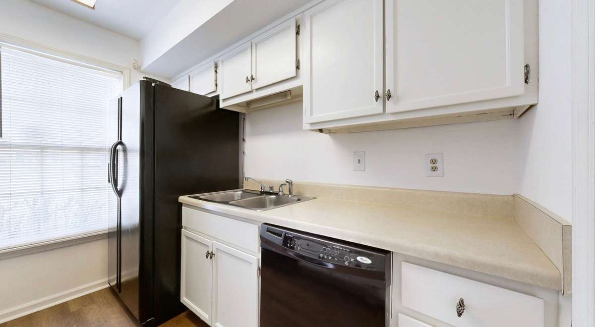 All appliances remain. New flooring.