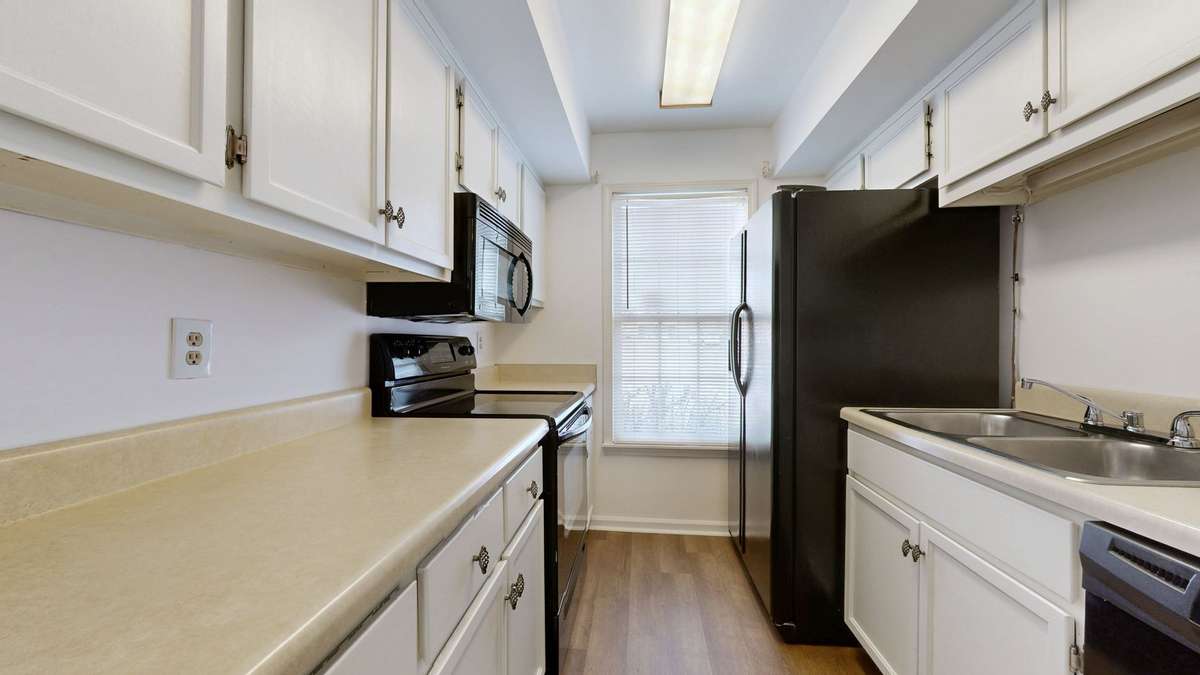 Refrigerator, Dishwasher, Smooth top Range and Microwave included.