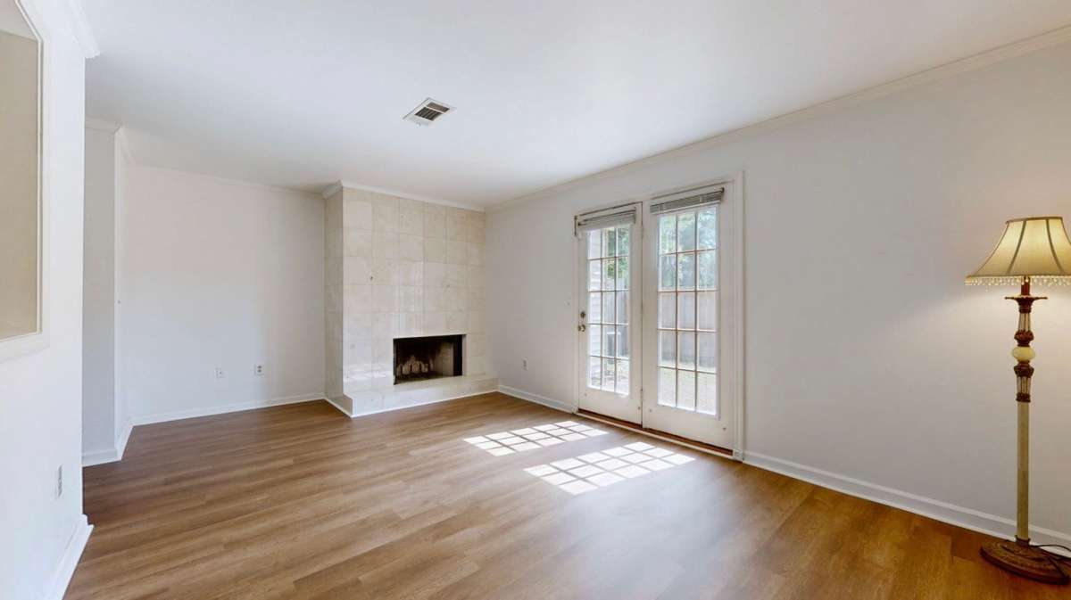 NEW Luxury Vinyl Plank flooring and fireplace in the Great Room.