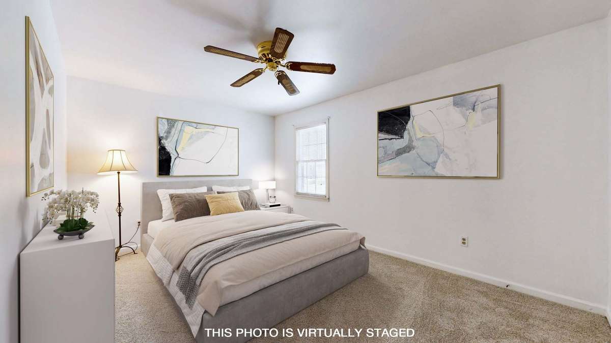 Guest bedroom with new carpet.