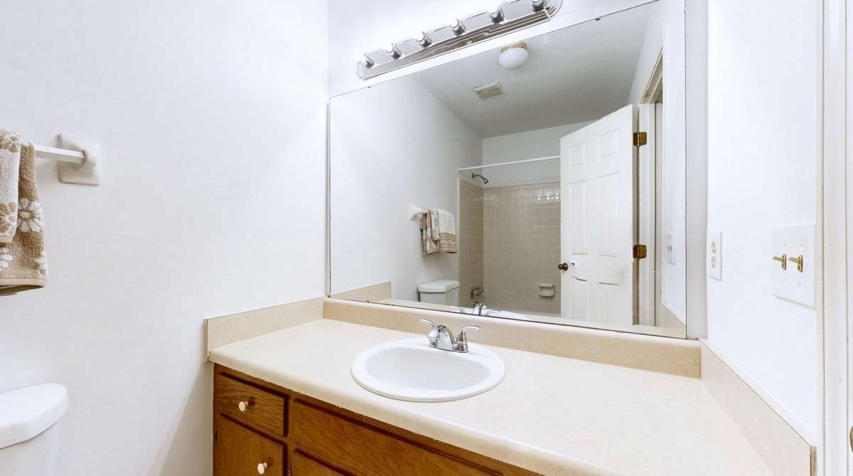 Large vanity in guest bathroom.