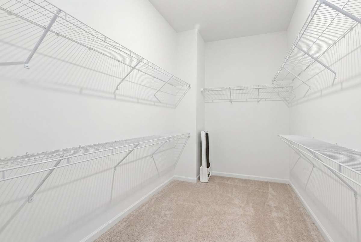Primary walk in closet.