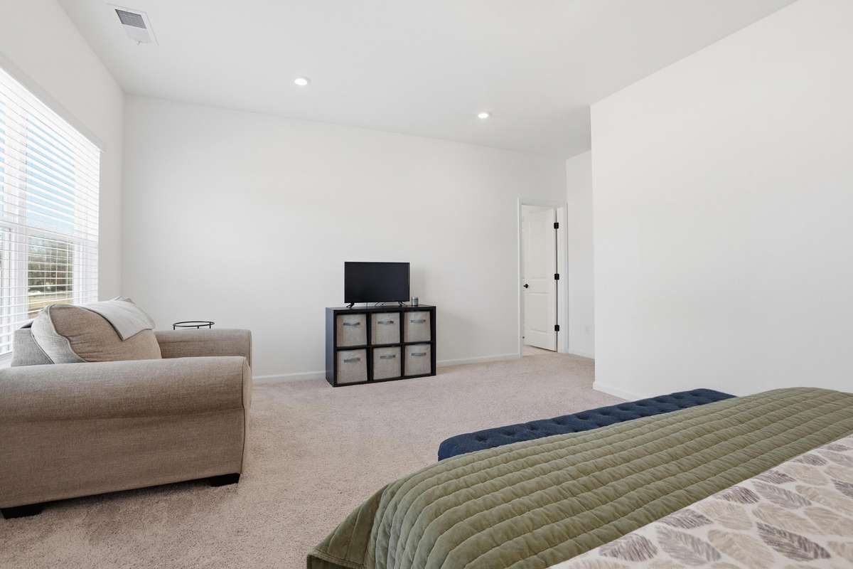 Huge primary bedroom upstairs.