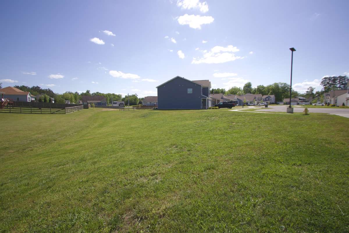 All this side yard is your's too! Plenty of space to do what you would like.