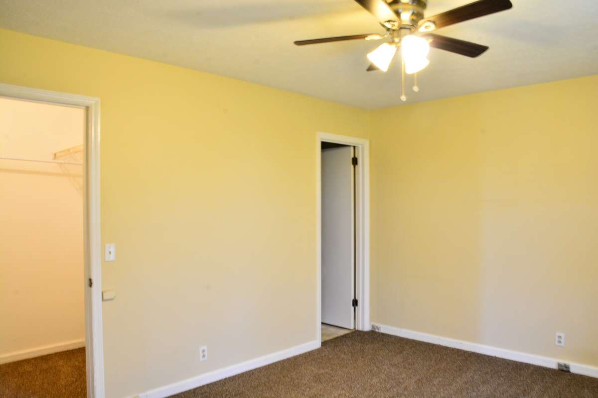The master bedroom has a large walk-in closet and a full bath with a tub/shower combination.