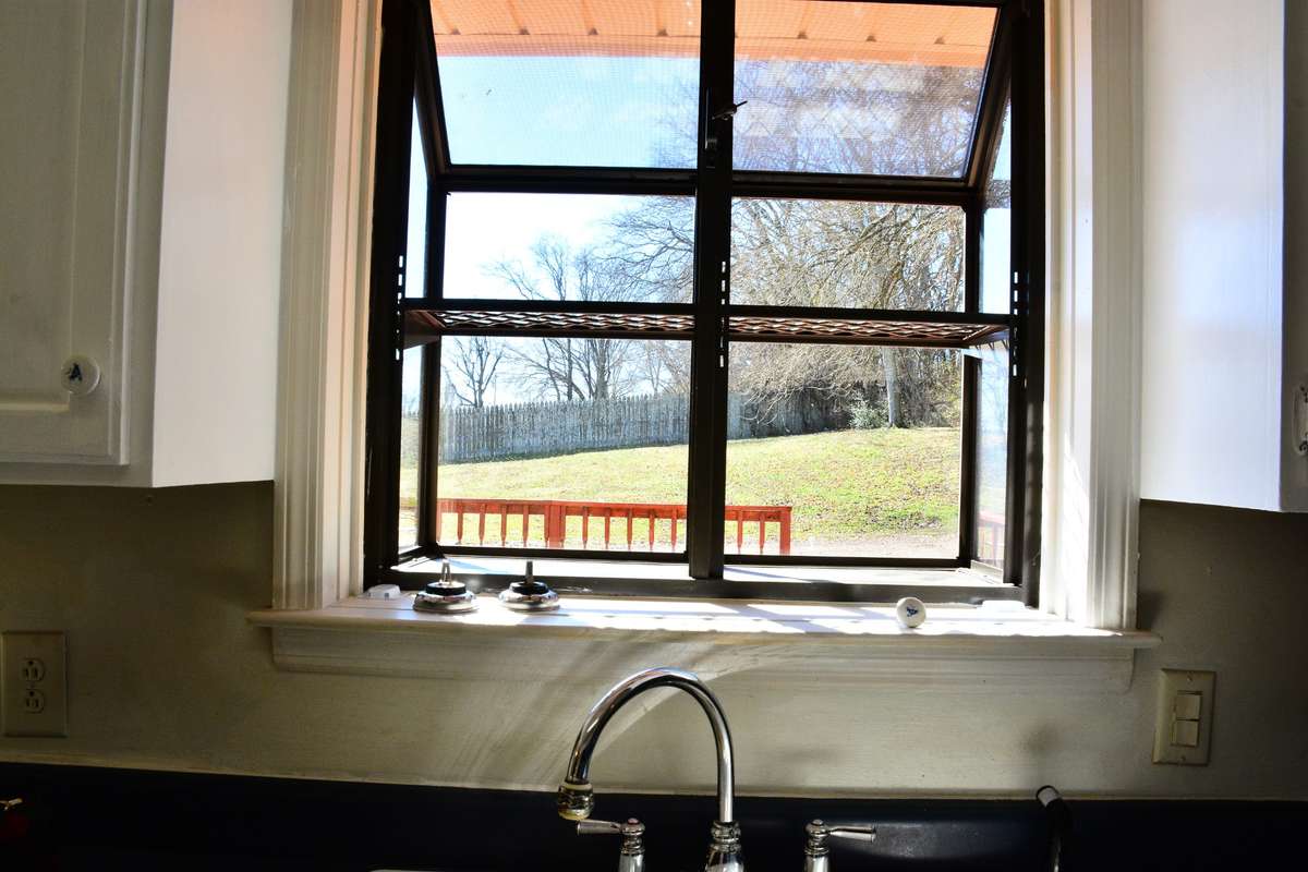 The kitchen also features a plant shelf for those that like to grow fresh herbs or that special plant that makes you smile when you look out the window any time of the day.