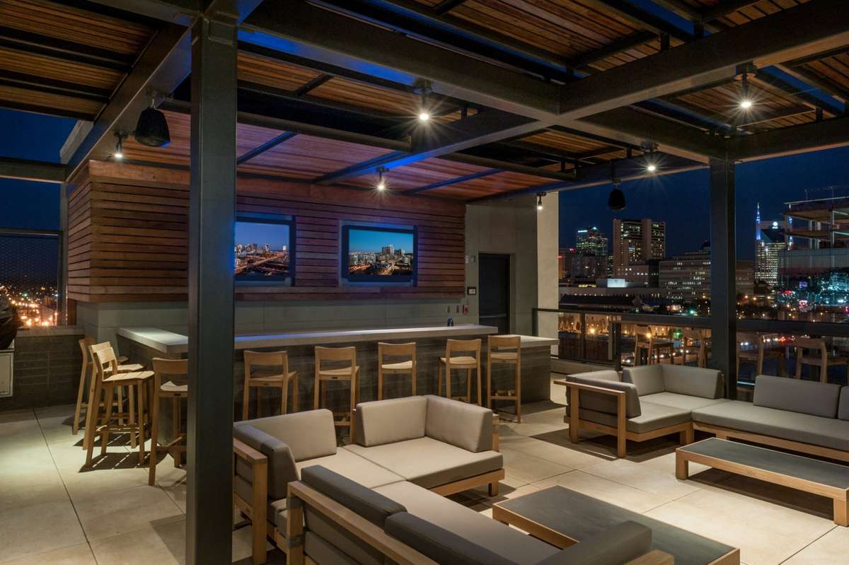 Multiple lounge areas are beautifully appointed on the outdoor amenity deck