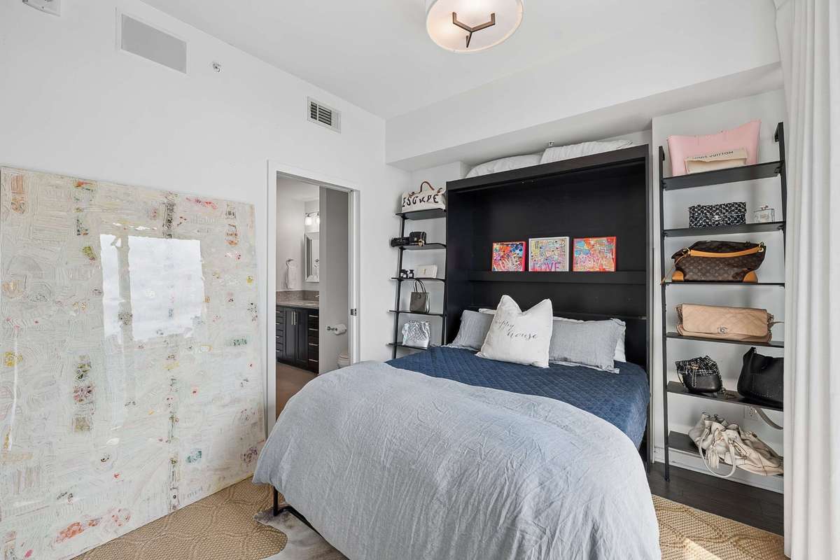 The perfect guest room with a bathroom and floor to ceiling sliding glass doors leading you to your balcony